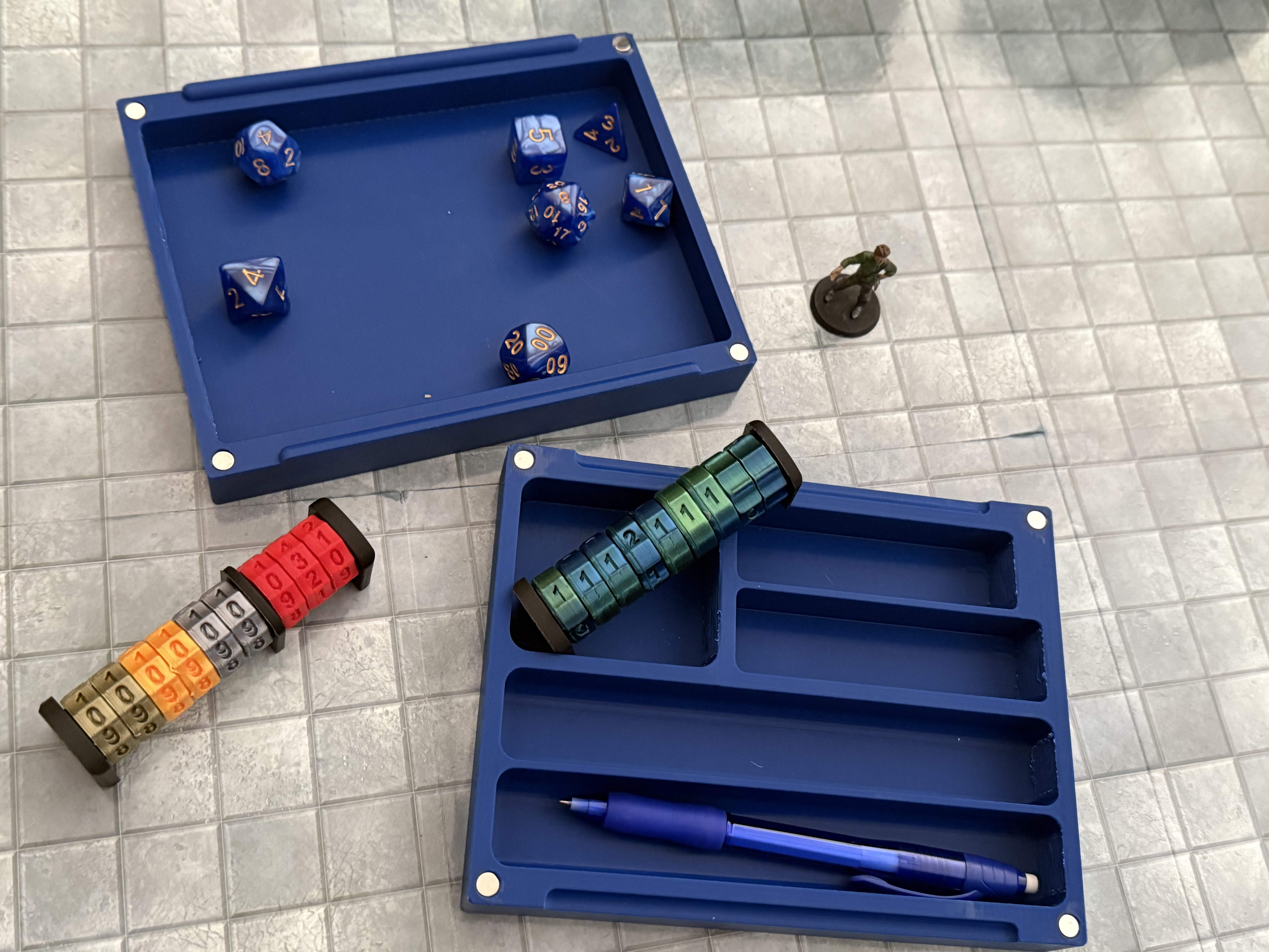 Open Critical Kids dice box with dice and mini